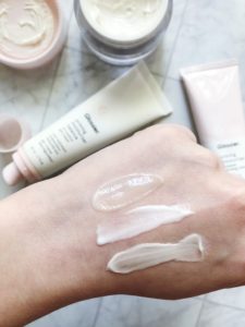 Swatches of Glossier moisturizers