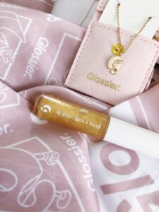 Glossier G Charm Necklace, Gold Lip Gloss and Scarf