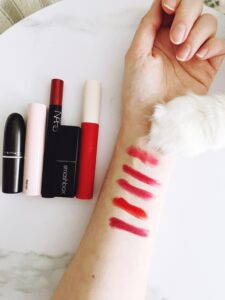 The best holiday red lipsticks via The Beauty Minimalist